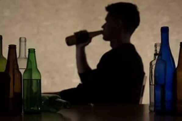 A person consumes alcohol